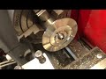 Face profiling a turbine wheel blank