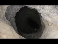 Dropping an iPhone X Down 4000 FT Deep Hole! - What's In There?