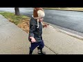 Toddler in the Rain in his ZARA Rain Coat & Nununu Boots