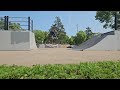 Backside Ollie Quarterpipe To Bank Transfer At The Onalaska, Wisconsin Skatepark - Brandon Hanson.