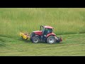 Grass cutting and hay baling with Case IH Maxxum 115 and Farmall 85 tractors