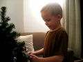 Caleb and Megan decorating their trees 2010