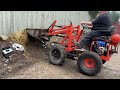 Homemade super cheap mini loader in action