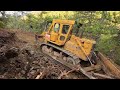 How does a bulldozer create new roads by cutting through hills? #bulldozer #caterpillar