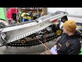 Rebuilding a crashed snowmobile from the ground up. Straightening the chassis and bulkhead.