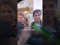 Palestinian children get happy after receiving snacks