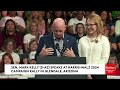 'Let's Get This Done': Mark Kelly And Gabby Giffords Celebrate Harris-Walz Ticket At Arizona Rally