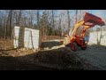 Kubota L2501 Spreads rock for Carport install part 1