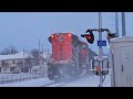 CN ore train dashes through the snow in downtown Grove City, PA