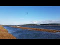 Kiteboarder in 25 to 30 knots, higher gusts.  Whidbey Island Washington, USA.  January 5, 2020.