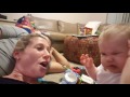 Baby Bites mommy's nose