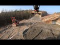 Rock breaking on a slope for a 50 ton crane with a driveway