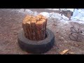 Колка дров с помощью покрышек.  Chopping wood with tires.