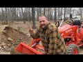 Kubota L2501 Uses Grizzly to separate rock from dirt