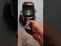 Welding helmet auto darkening test with tv remote