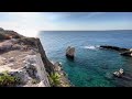 Early morning walk along the rocky coast of Siracusa