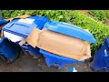 Rear load garbage truck recycle carts commercial POV