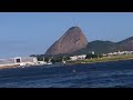Looking at a plane, by boat. In Rio