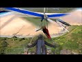 Hang gliding.  Video compilation of launching, soaring, circling,  and landing.  Song 