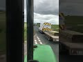 Idiot car drivers overtaking a right turning Tractor.
