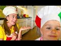 Дети учатся готовить пиццу и помогать друг другу