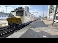 Diverse treinen in de avondspits op station Leuven (VL), 19 mei 2023