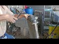 scrapping an automotive radiator for aluminum.