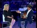 Catherine Deneuve sings with Gianni Morandi in Italian show