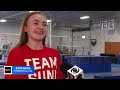Young gymnasts cheer on Suni Lee at her Minnesota training gym
