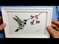 Art from pressed flowers 'Hummingbird with A Flower'. Handmade Gift idea with natural objects.