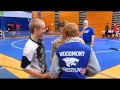 Navy sailor surprises brothers at high school wrestling tournament