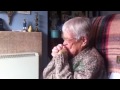 92 year old Finnish woman watching Finland beat Russia at ice hockey