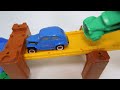 Various Cars miniature cars climb Tomica's automatic hill and jump into the blue water.