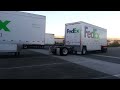 Hooking up to a second trailer with dolly on the lead trailer Fedex Ground Driver