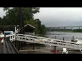 AWESOME BOAT FORK LIFT PUTTING BOATS IN WATER FROM A THREE STORY STORAGE UNIT ON THE COAST