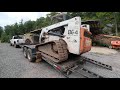 Dragging a broken Bobcat with a dozer