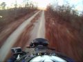 DJ Sasha helps fly my KLR650 to the VOR tower on top of Sand Mountain SC