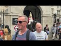 TWICE! DISRESPECTFUL US TOURISTS IGNORE THE NEW SIGNS AND TOUCHES THE HORSE at Horse Guards!