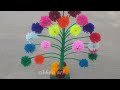 un se flower banane ka tarika/woolen flower making with fingewoolen Guldasta craft idea