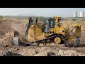 Caterpillar D9T Bulldozer Working On Huge Mining Area