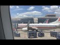 Pulling in right next to a American  737 in the classic livery