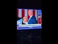 Joe Biden coughs into his hand