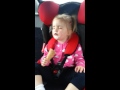 Baby eating ice cream while asleep