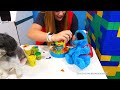 Assistant Explores Tunnels and box fort for the Elmo Play Doh Color Mixer