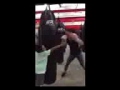 Miss MarGMillionaire punching heavybag