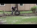 SIMPLE TRICK - stump pulling using a log chain, tire, and a vehicle