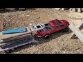 cen f450 red body and VW doka scx10 custom truck both haul a big load of wood on custom goose necks