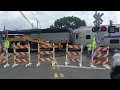 NJ Transit train creeps through crossing under construction