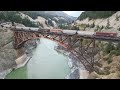 Simultaneous trains crossing the Fraser canyon at scenically stunning Cisco, British Columbia