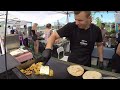 Street Food in Warsaw, Poland. Burgers, Pita Gyros, Paella, Langos, Pancakes and more